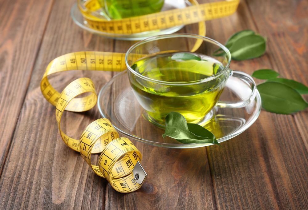 اشربي الشاي الأخضر غير المحلى تنحيف الجسم بالكامل في المنزل